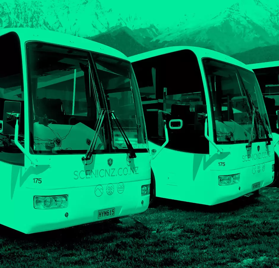 Scenicnz, three coaches lined up with a green filter over the image